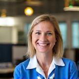 Ella Roberts at service desk