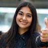 Priya K. giving thumbs up